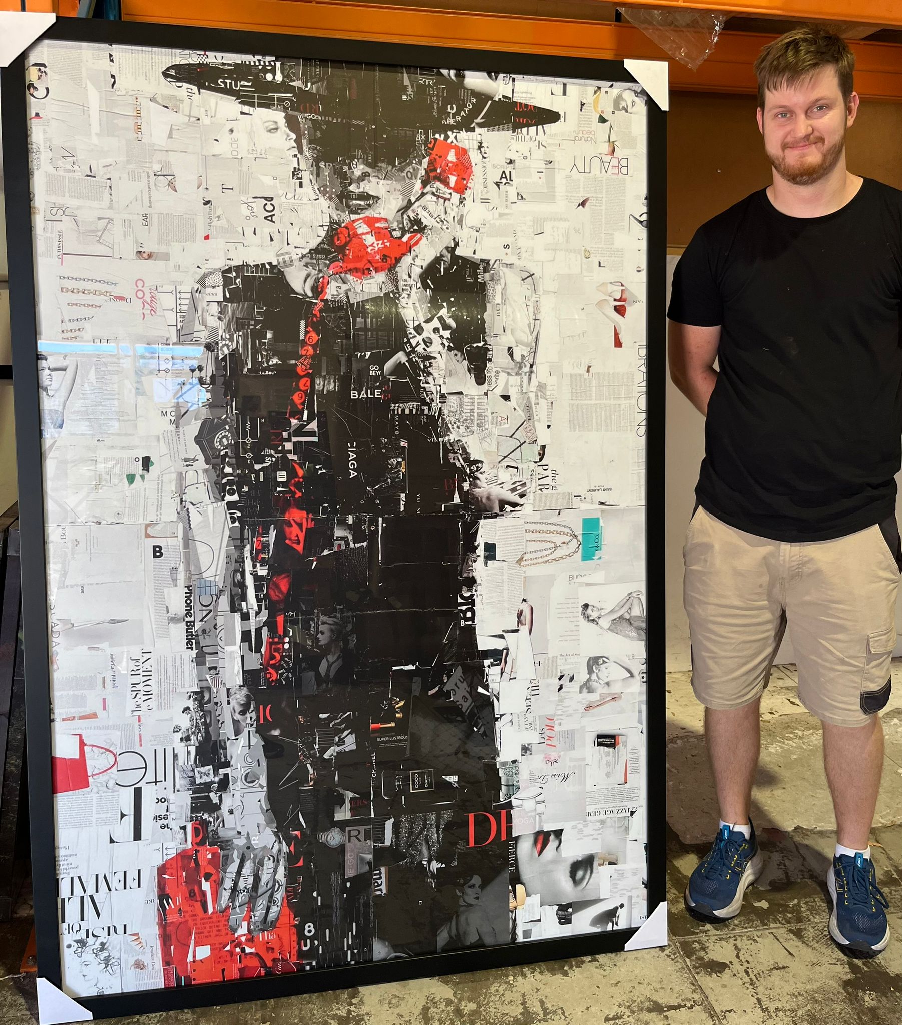 Steve with large custom framed artwork